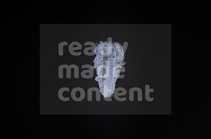 Blue powder strokes on black background