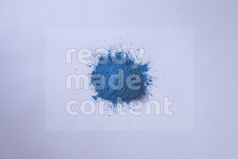 Blue powder on white background