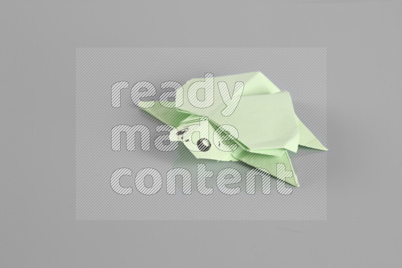 Origami animals on grey background