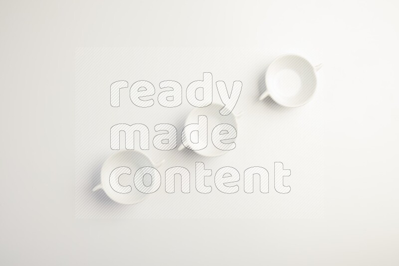 white ceramic round sauce dish on white countertop