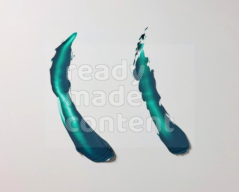 Turquoise curved painting knife strokes on white background