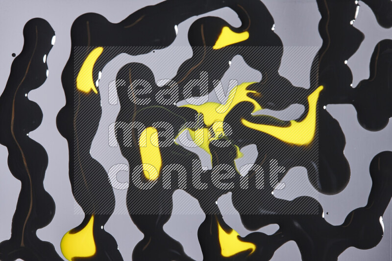 خلفية ملونة مع مزيج من ألوان الطلاء الأصفر والاسود