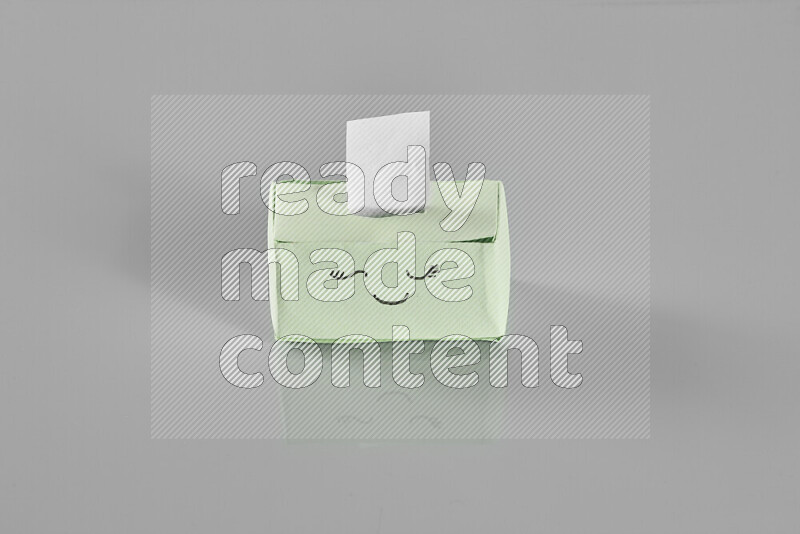 Origami tissue box on grey background