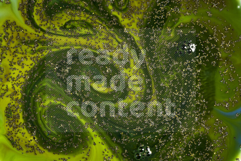 A close-up of sparkling gold glitter scattered on swirling green background