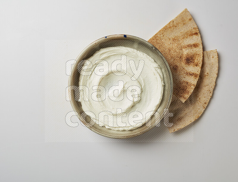 Plain Lebnah  in a grey pottery plate on a white background