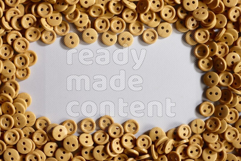 Wooden buttons placed on grey background