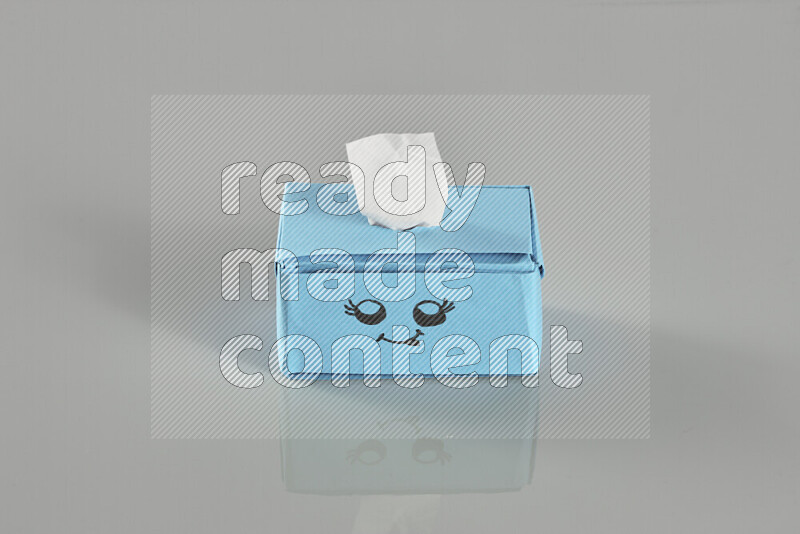 Origami tissue box on grey background