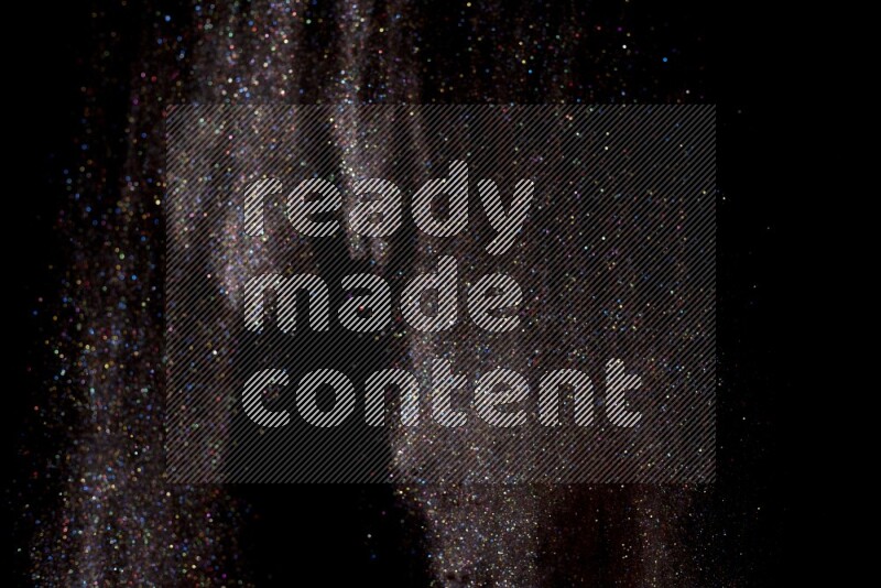 Multicolored glitter powder isolated on black background