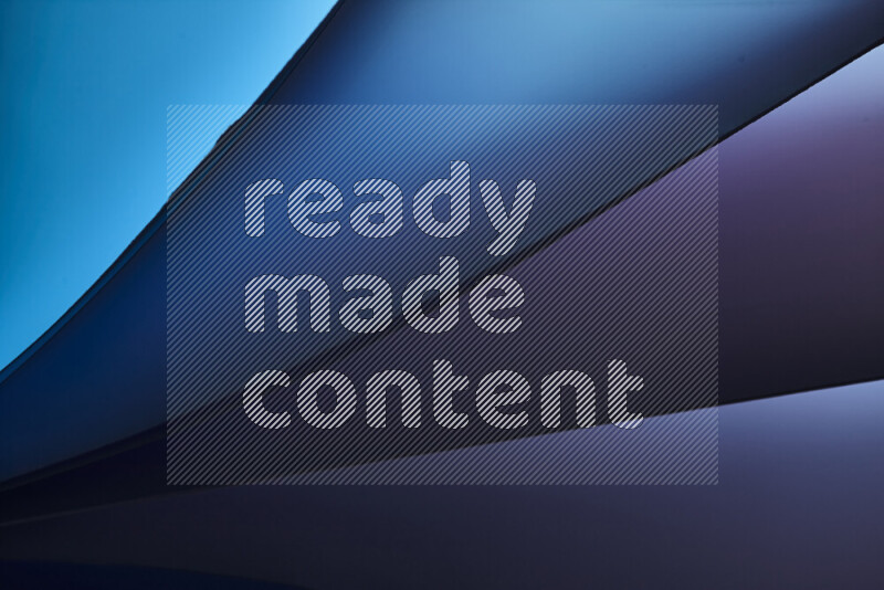 An abstract art piece displaying smooth curves in cold gradients created by colored light