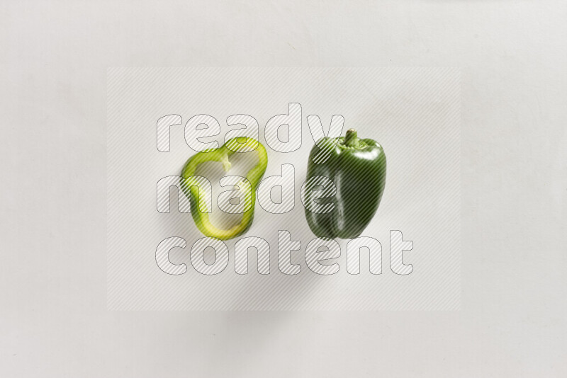 Green bell pepper on white background