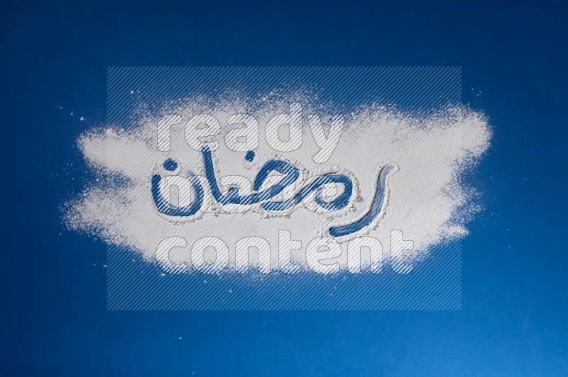 A word written with powder on blue background