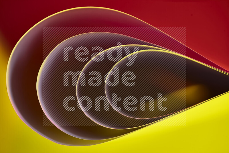 An abstract art of paper folded into smooth curves in yellow, brown and red gradients