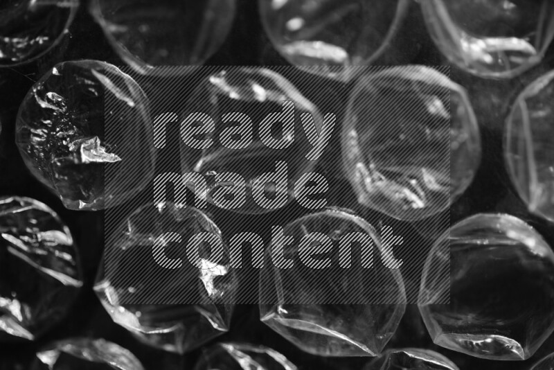 Bubble wrap texture on black background