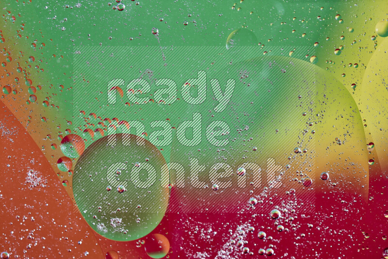 Close-ups of abstract oil bubbles on water surface in multicolors