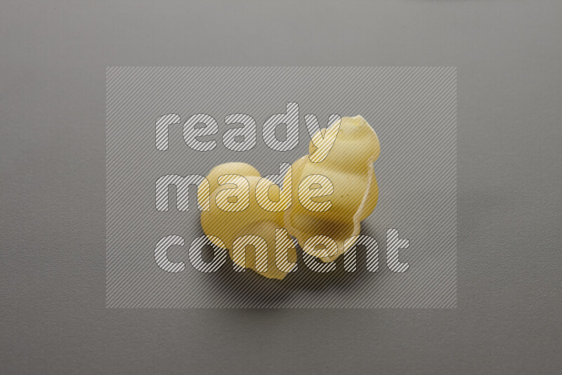 Snails pasta on grey background