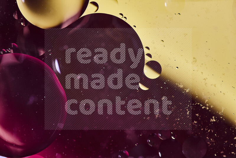 لقطات مقربة لفقاعات من الزيت على سطح الماء باللون الأحمر والأصفر