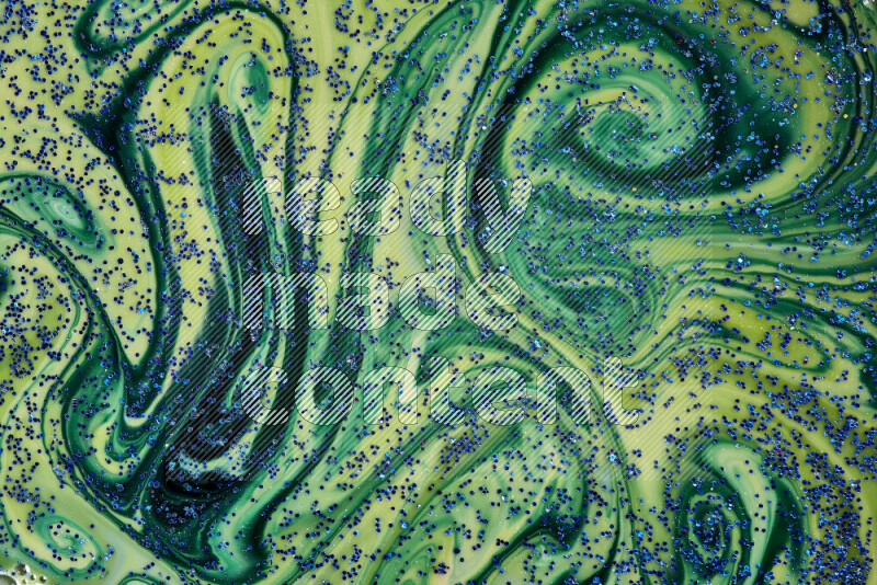 لقطة مقربة لبريق أزرق متلألئ منتشر على خلفية من اللون الأزرق والأخضر في حركات دائرية