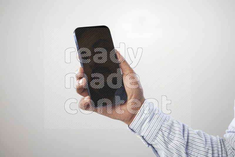 Male hand holding Smart phone on White background