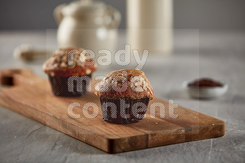 Peanut cupcake on a wooden board