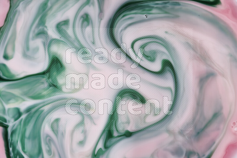 صورة مقربة لأنماط دوامية مجردة باللون الأحمر والأخضر