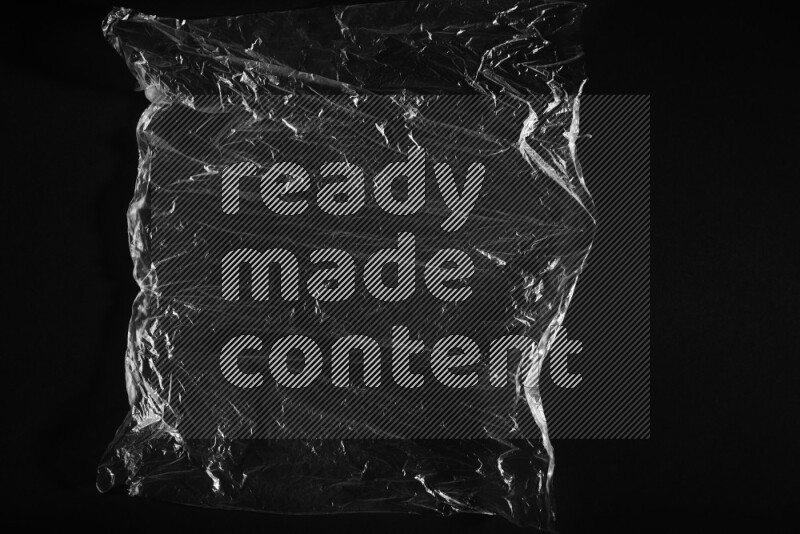 Transparent plastic textures on black background
