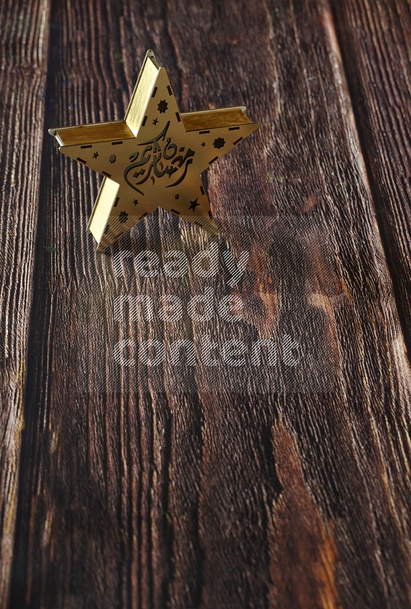 A lantern placed on a wooden background