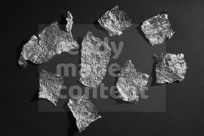 Aluminium foil on black background