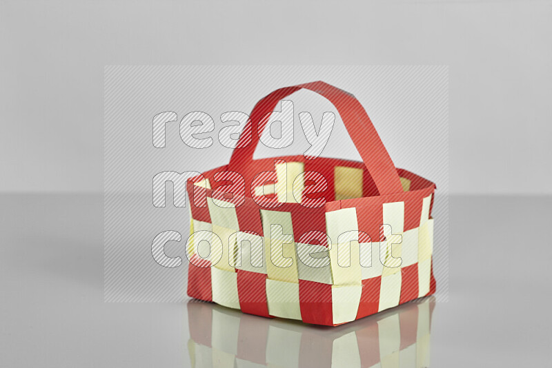 Origami easter basket on grey background