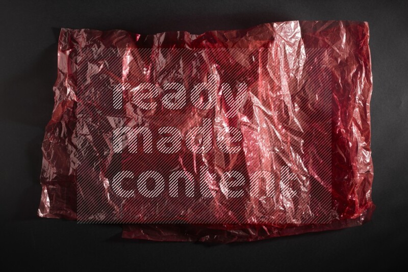 Colored plastic textures on black background