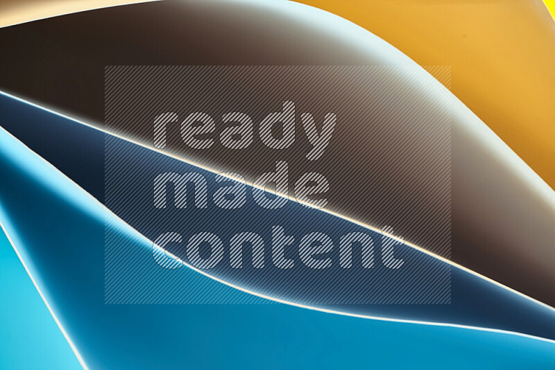 This image showcases an abstract paper art composition with paper curves in blue and orange gradients created by colored light