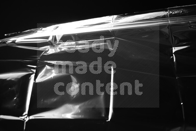 Plastic wrap texture on black background
