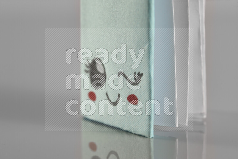 Origami book on grey background