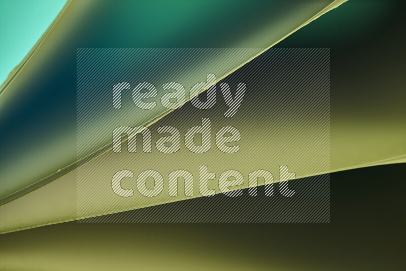 فن تجريدي يعرض منحنيات مع تدرجات الألوان الباردة مكونه بضوء ملون