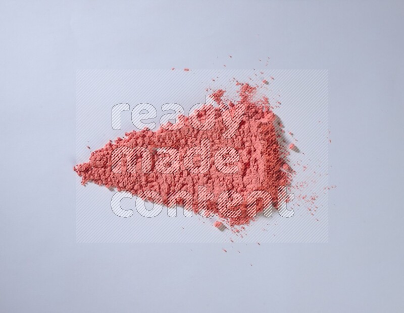 Red powder strokes on white background