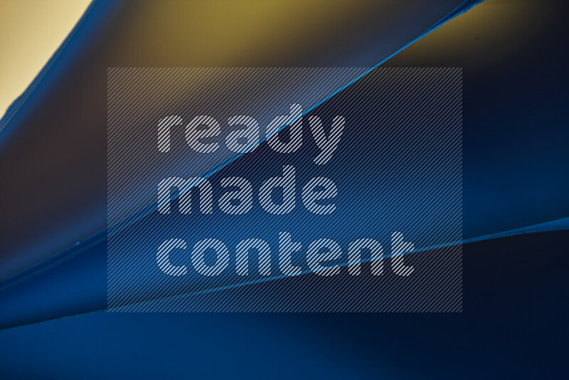 An abstract art piece displaying smooth curves in warm and cold gradients created by colored light