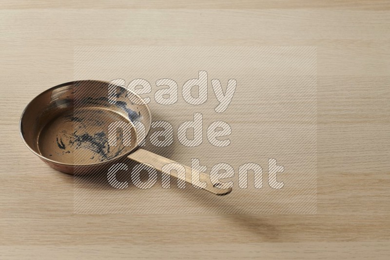 Small Copper Pan on Oak Wooden Flooring, 45 degrees
