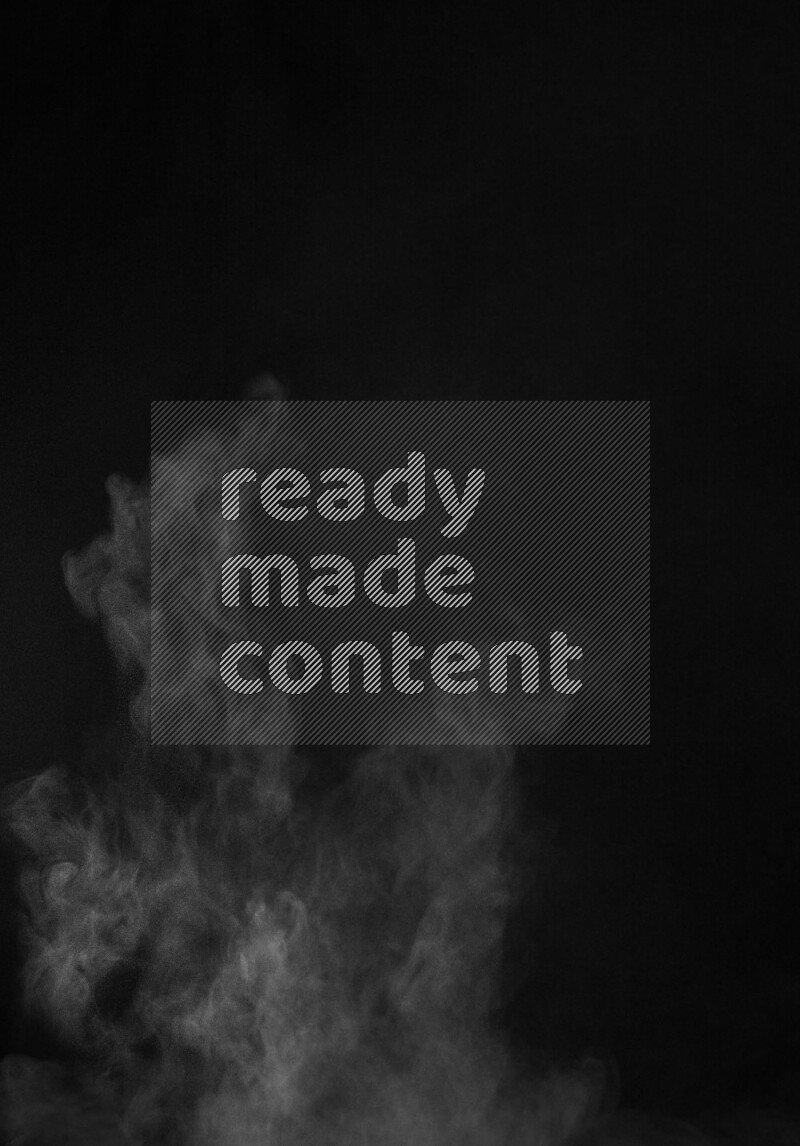 A side view of yellow powder explosion on black background