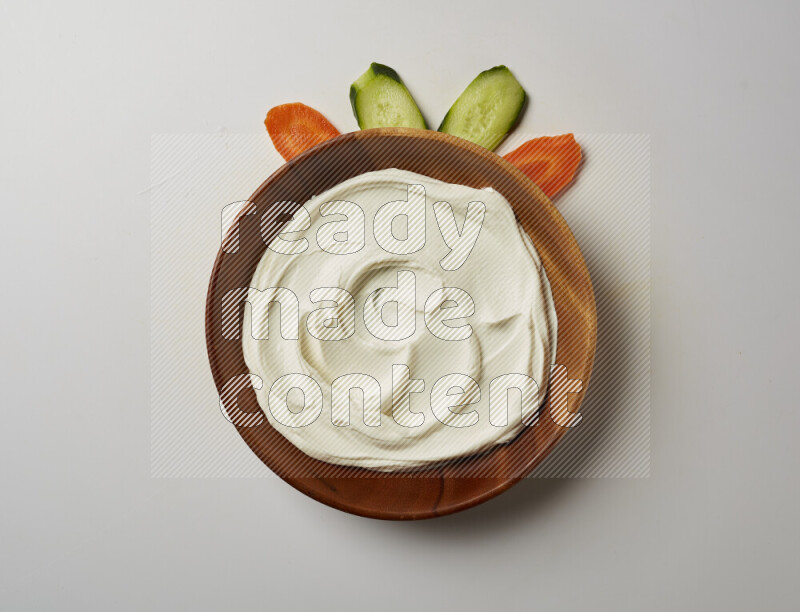 Plain Lebnah in a wooden plate on a white background
