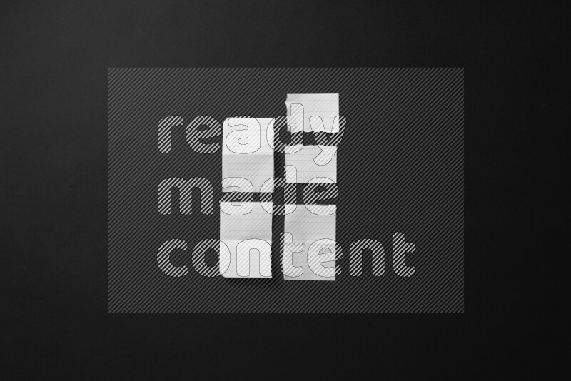 Ripped notebook sheet on black background