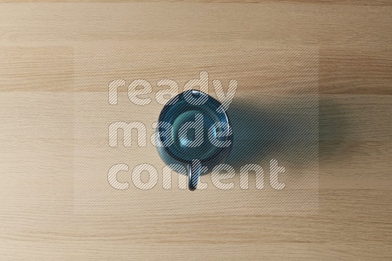 Top View Shot Of An Empty Glass Jug on Oak Wooden Flooring