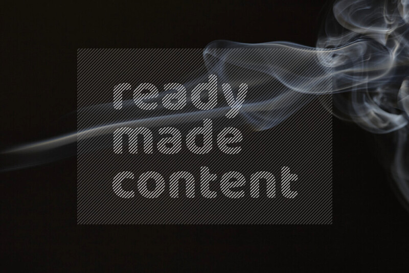 Motion of wavy smoke isolated on dark background