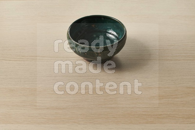 Dark Green Pottery Bowl on Oak Wooden Flooring, 45 degrees