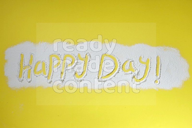 A sentence written with powder on yellow background