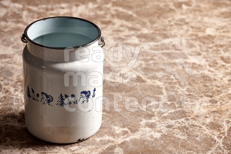 Vintage Milk Can on Beige Marble Flooring, 45 degrees