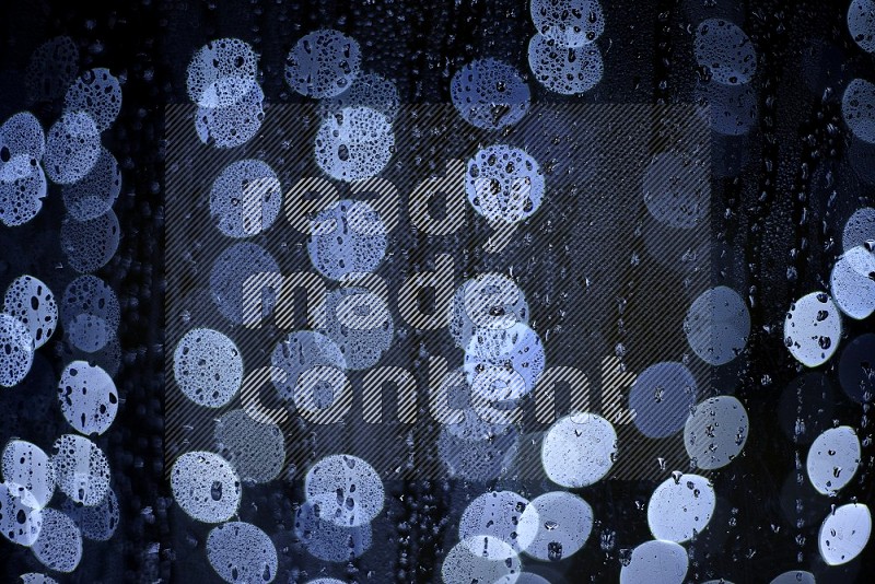 Bokeh light in white with water drops