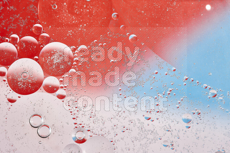Close-ups of abstract oil bubbles on water surface in shades of red, white and blue