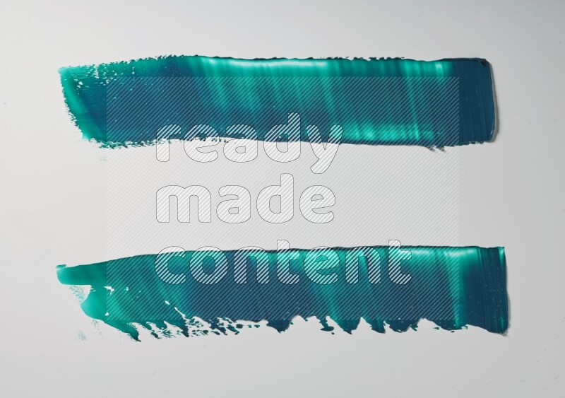 Turquoise painting knife strokes on white background