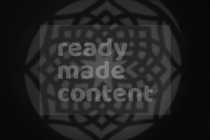 A collection of gobo light projections showcasing geometric patterns onto a smooth surface