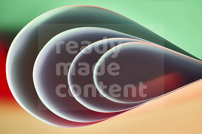 An abstract art of paper folded into smooth curves in green and red gradients