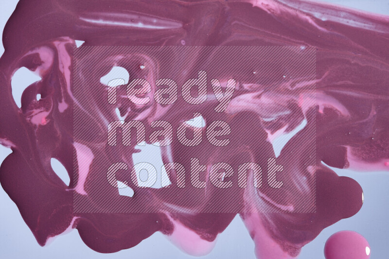 خلفية ملونة مع مزيج من ألوان الطلاء الأرجواني والوردي